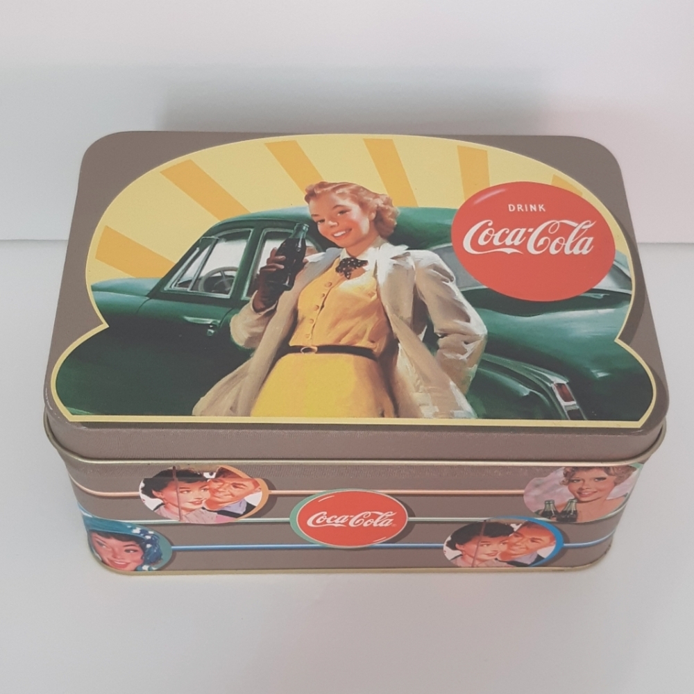 Coca-Cola tin - lady in yellow dress with green car